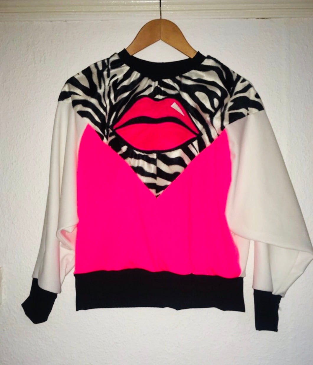 An Original Leroy Customised Neon Zebra Monster Kiss Batwing Sweatshirt